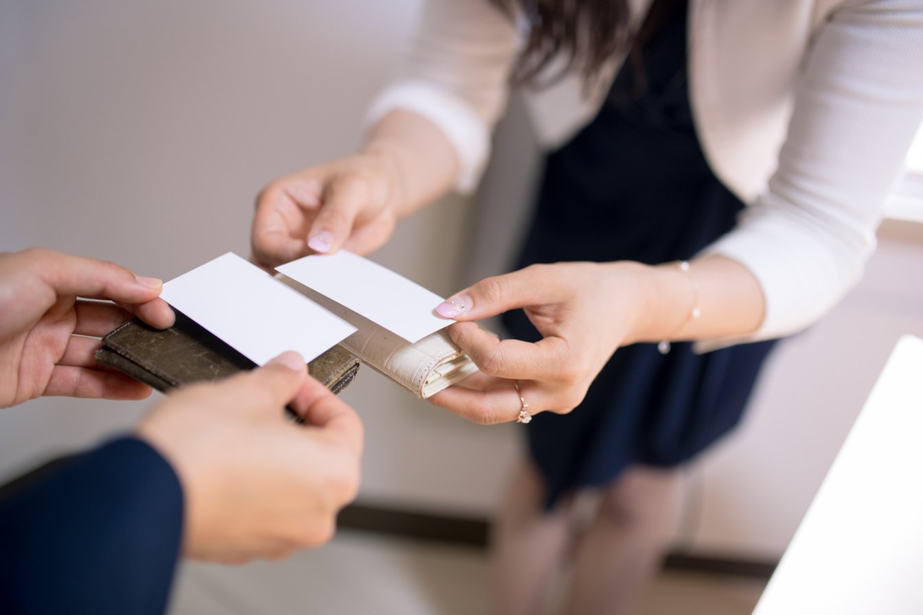 Japanese business women exchanging business cards